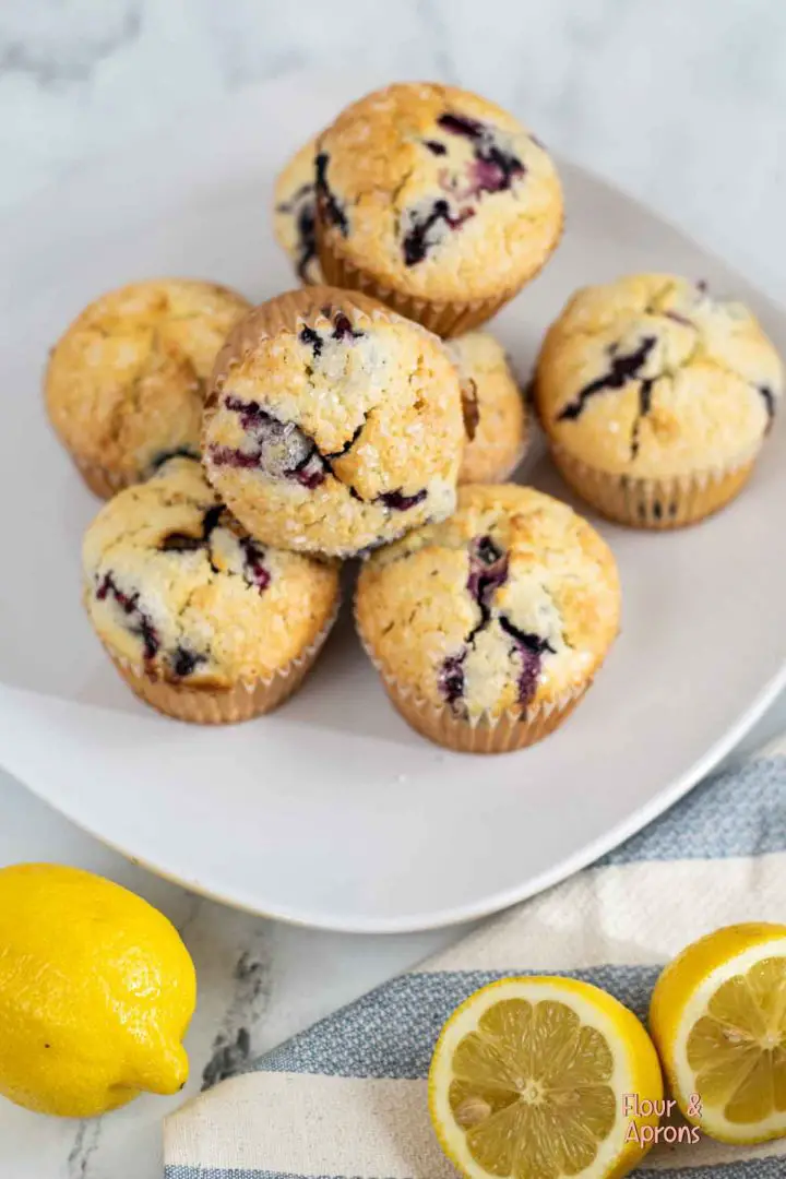 Closeup of blueberry lemon muffins on a plate.