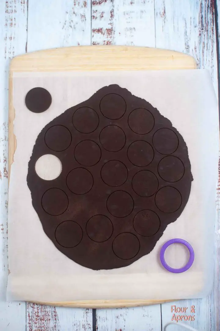 Cutting circles into the batter.