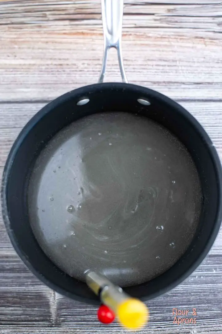 Water, sugar, and corn syrup in saucepan.