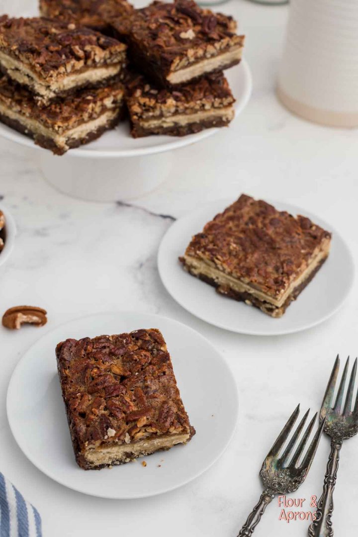 Pecan pie bars on a plate.